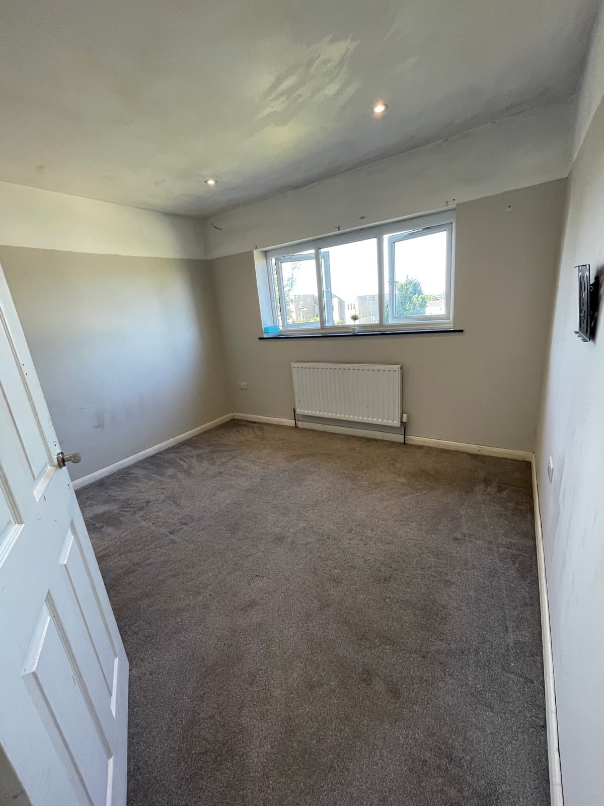 Bedroom 2 with garden window
